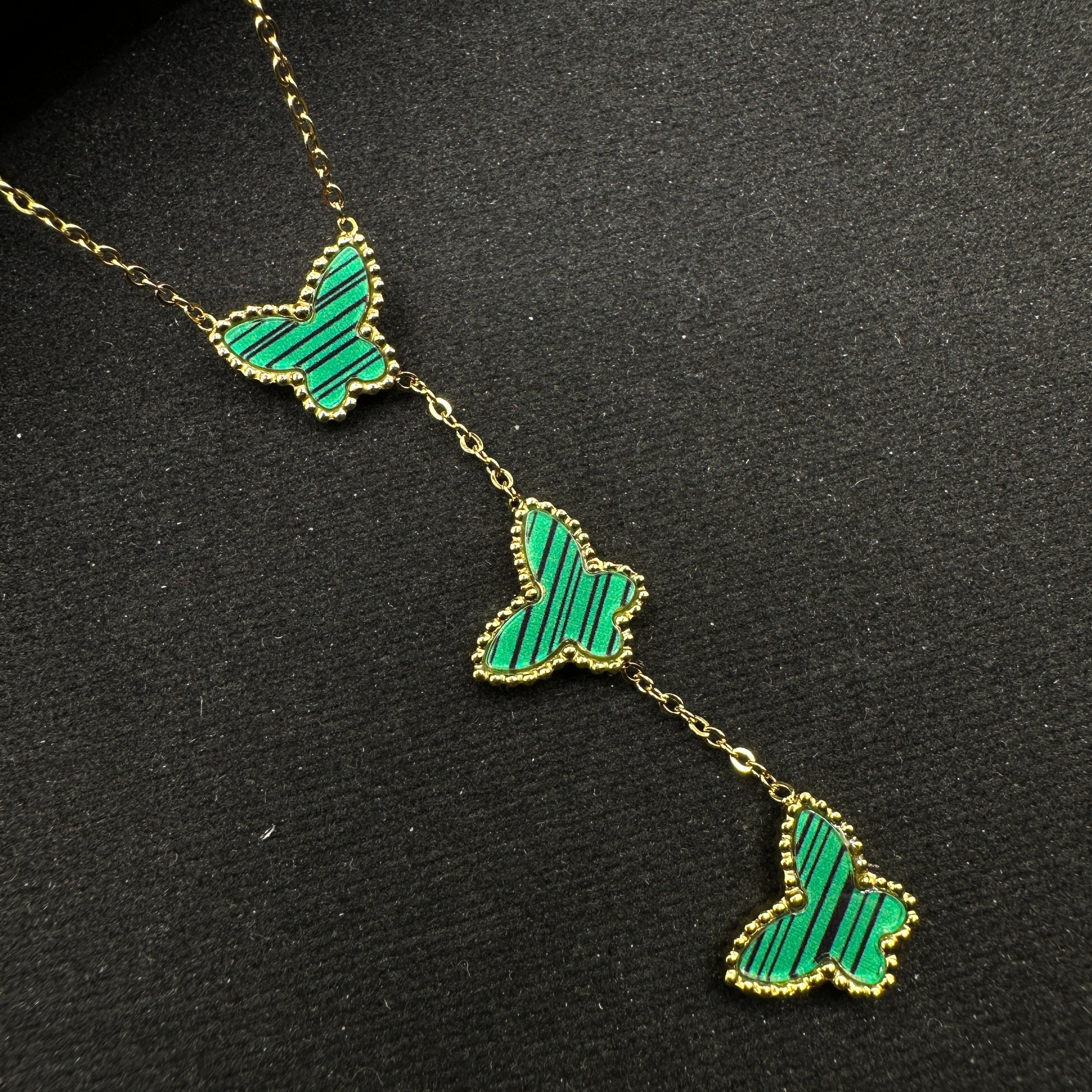 Emerald Flutter Trio Necklace